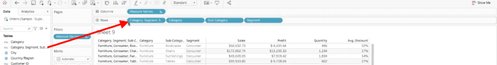 arrow highlighting path to drag combined fields dimension to rows bar in tableau dashboard