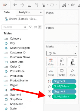 arrow pointing to sum of sales tab which is being used for pie chart label in tableau